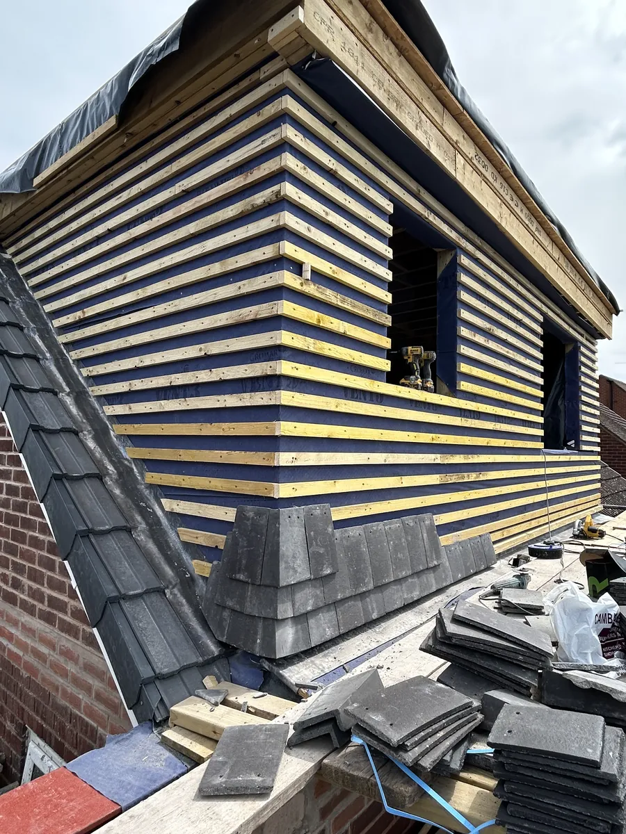 Dormer being built and tiled during a loft conversion