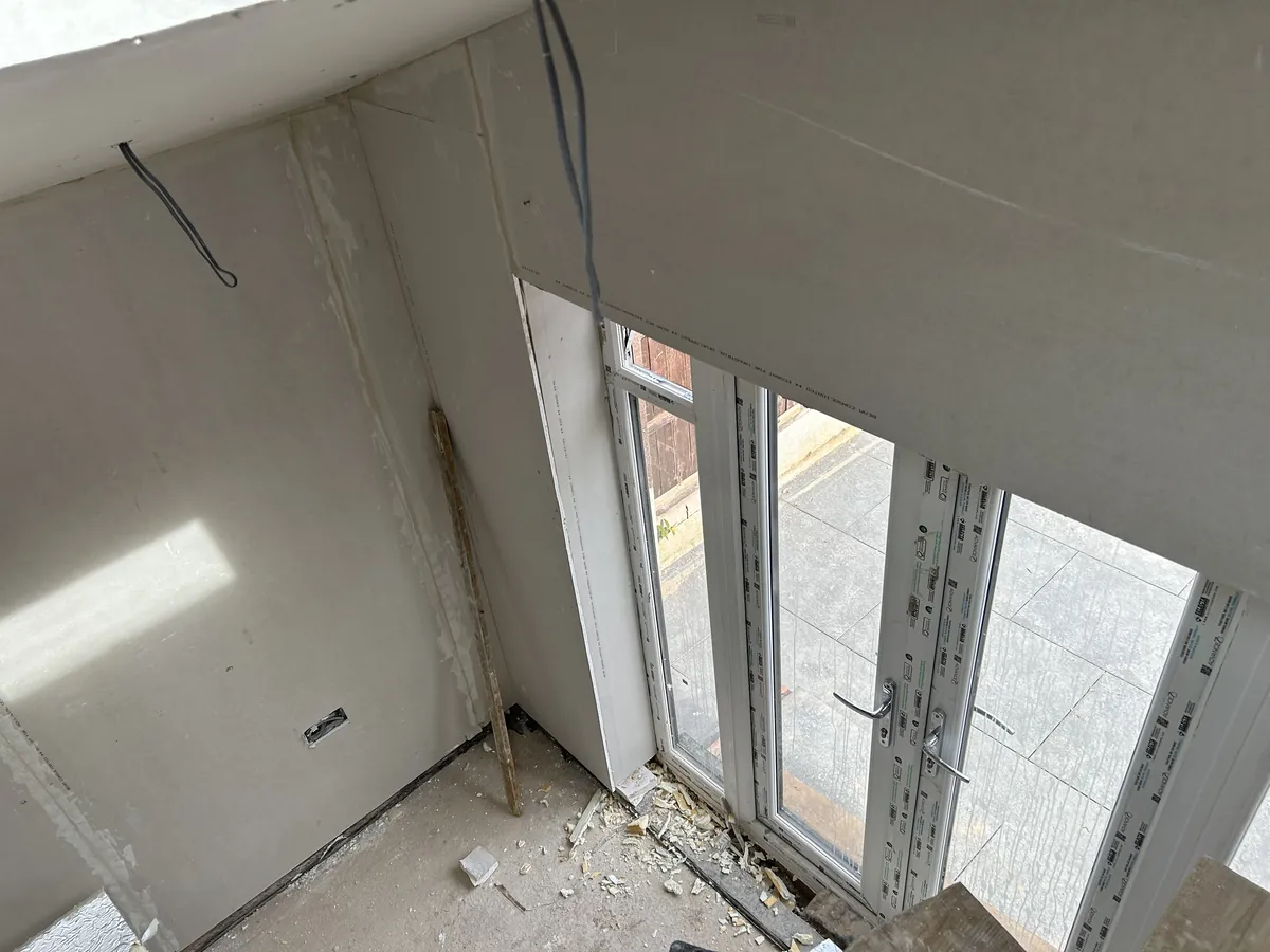 Extension interior lined with plasterboard during the build