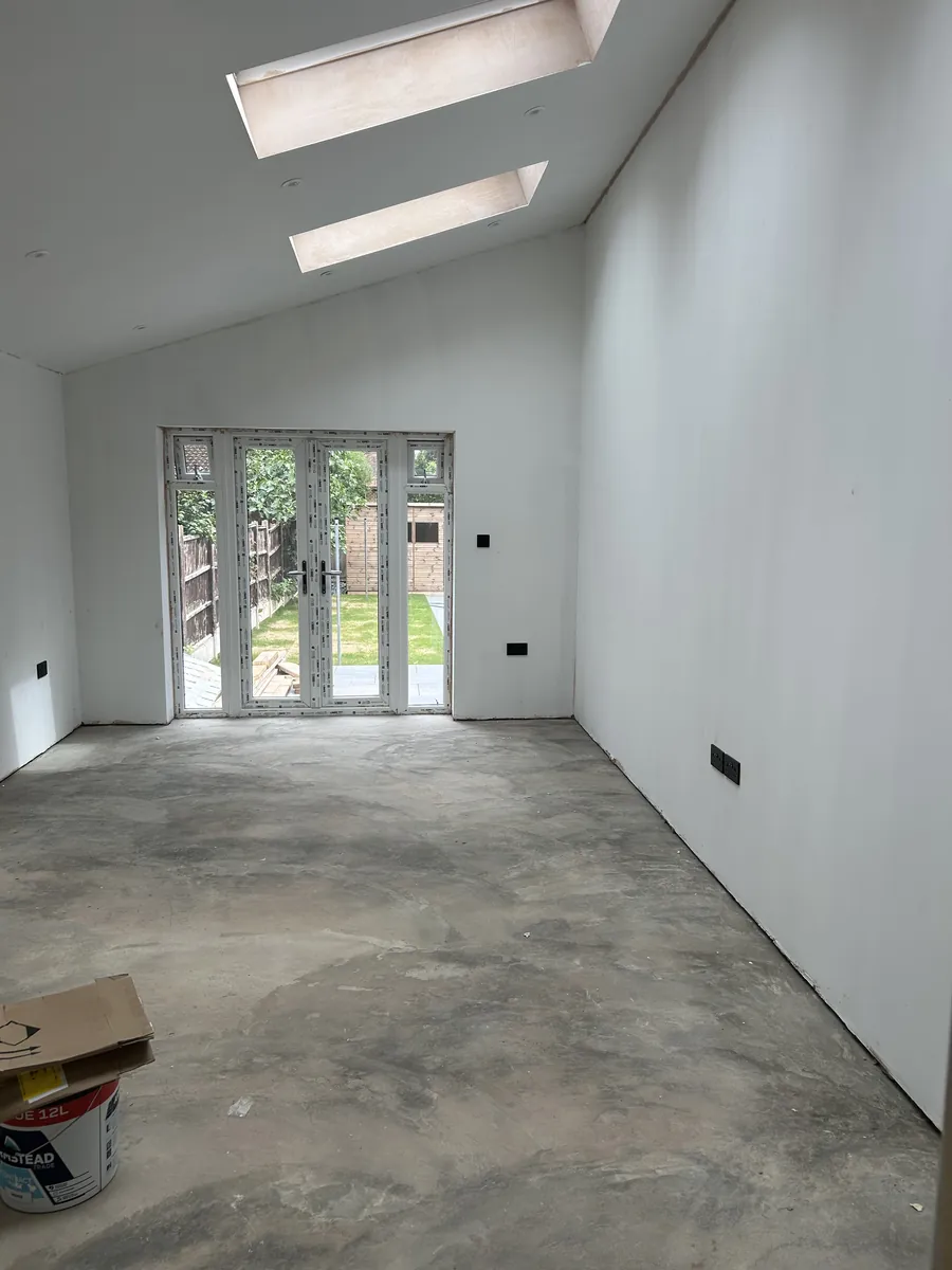 Extension interior with a vaulted ceiling and skylights