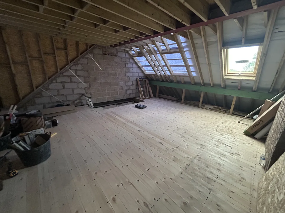 Loft conversion with a new timber floor and skylight