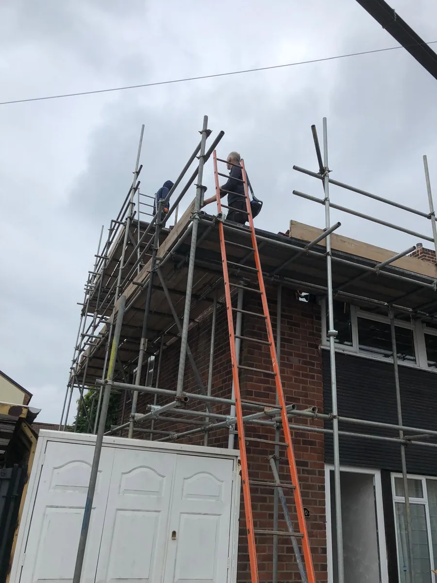 Roof works during a loft conversion with scaffolding