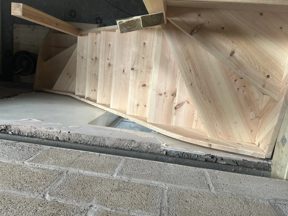 New timber staircase under construction for a loft conversion
