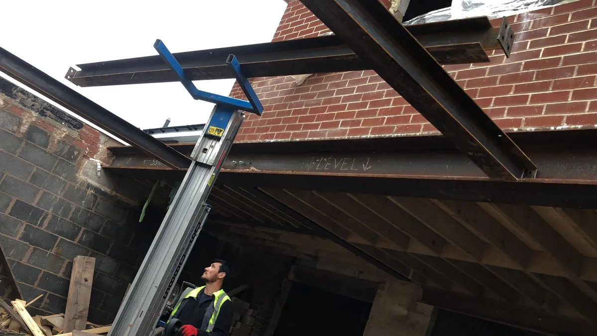 Installing a steel beam during structural works
